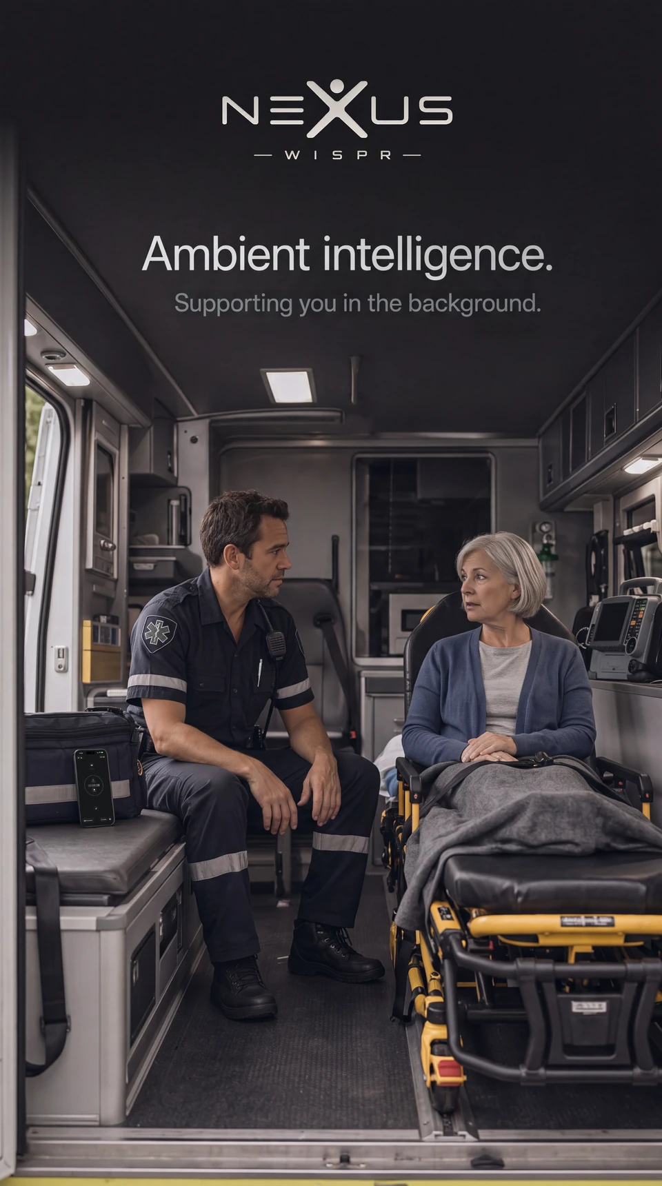 A paramedic talking with a patient in an ambulance, with Nexus Wispr nearby.