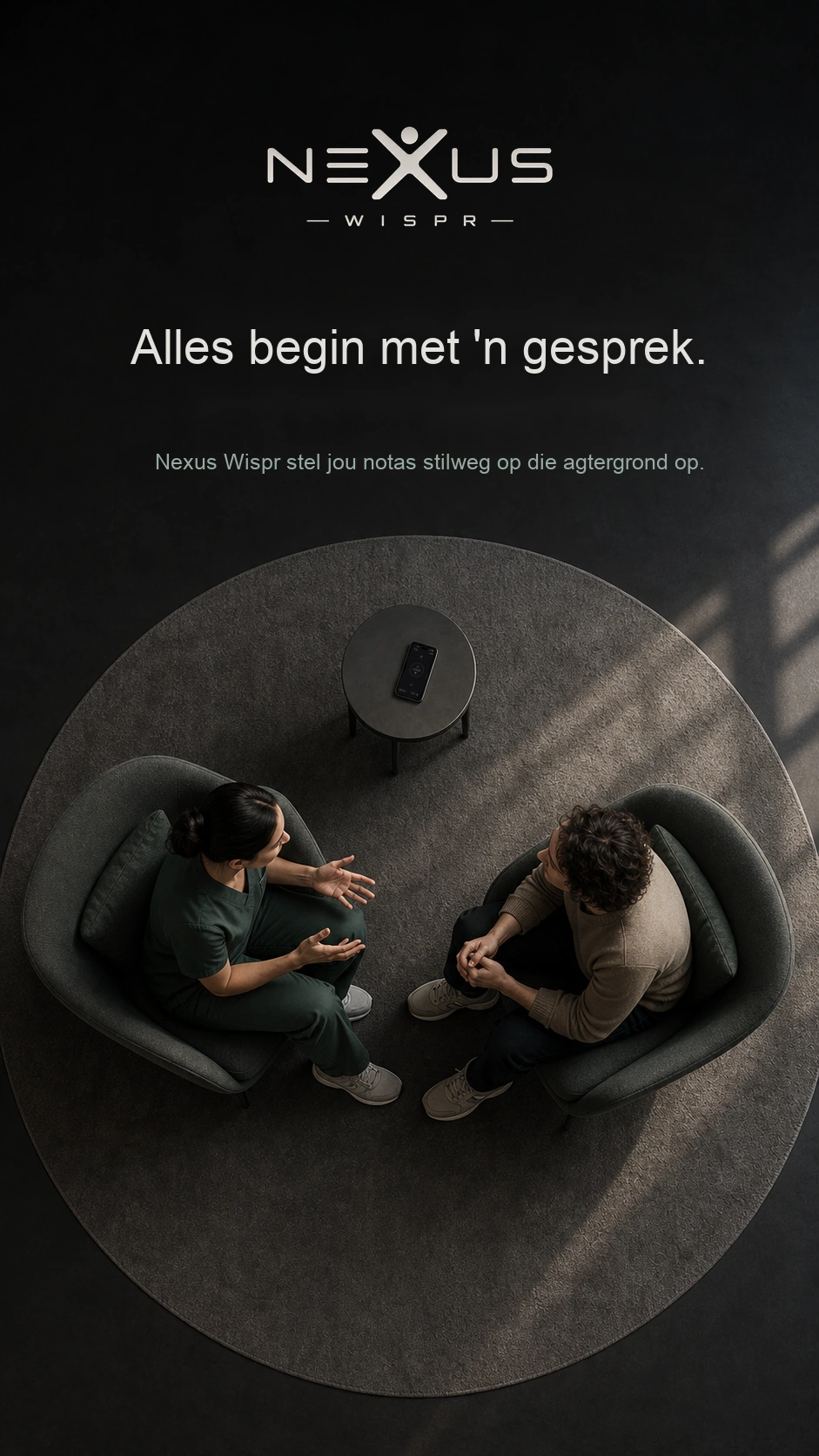 ’n Konsultasie van bo af gesien, met ’n foon wat op die klein tafel opneem.